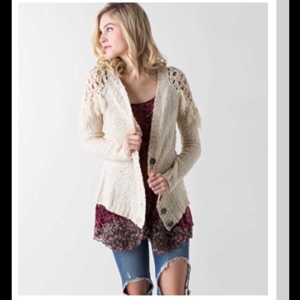 Gimmicks fringe sweater